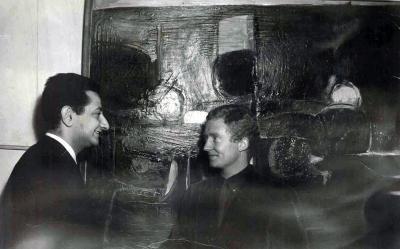 42i.59              Whiteley standing in front of 'Around Bathurst', l959, and receiving the Travelling Art Scholarship.jpg